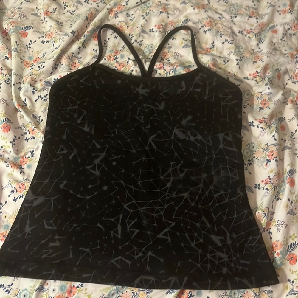 Lululemon t strap workout shirt with built in bra. Black and grey.